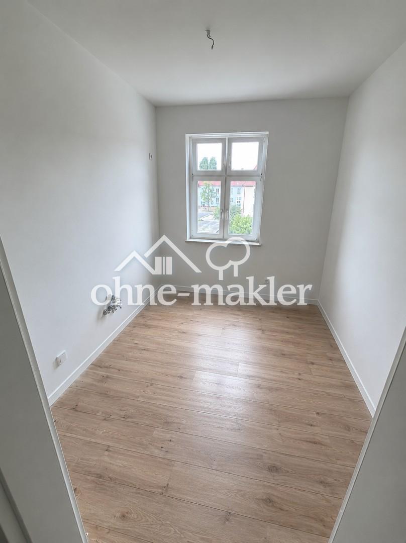 Hochwertig kernsanierte 4-Raum-Wohnung in Bitterfeld – modernes Wohnen nahe Goitzschesee - Photo 4
