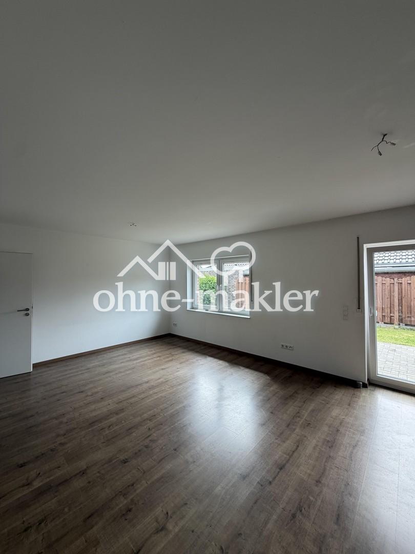 Doppelhaushälfte mit eigenem Garten, Terrasse & Carport in Weener - Foto 1