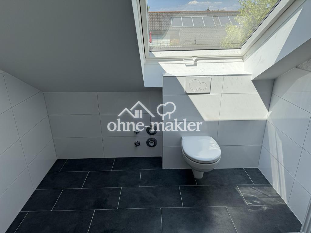 Sanierte 3-Zimmer-Dachgeschosswohnung mit Dachterrasse und Tiefgaragenplatz - Photo 5