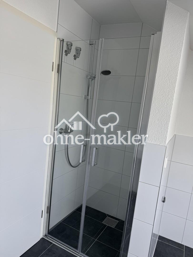 Sanierte 3-Zimmer-Dachgeschosswohnung mit Dachterrasse und Tiefgaragenplatz - Photo 4
