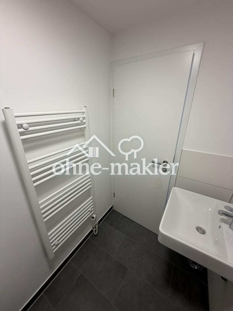 Erstbezug nach Kernsanierung: Moderne 2‑Zimmer Wohnung mit Sonnenbalkon & neuer Einbauküche in Rath - Photo 4
