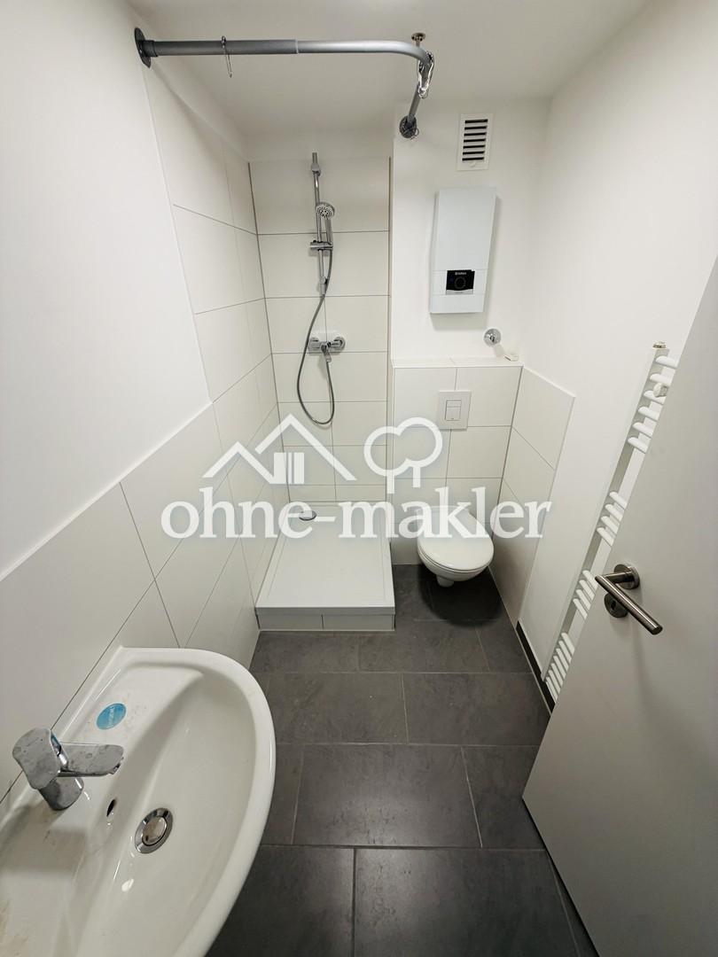 Erstbezug nach Kernsanierung: Modernes 1‑Zimmer‑Apartment mit Duschbad & Keller in Düsseldorf‑Rath - Photo 2