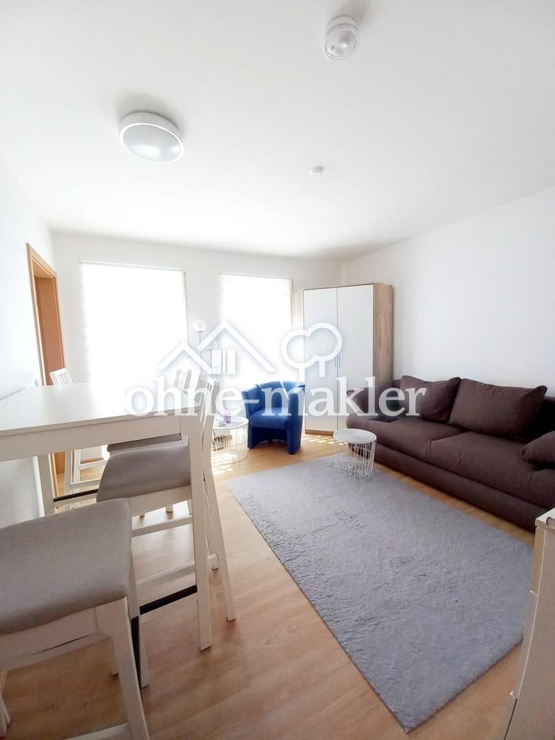 Lichtdurchflutete 1-Zimmer-Wohnung mit moderner Einbauküche & TG-Stellplatz - Foto 2