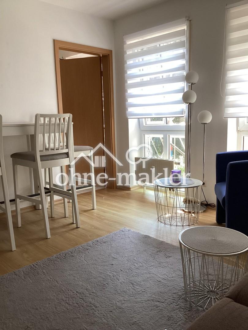 Lichtdurchflutete 1-Zimmer-Wohnung mit moderner Einbauküche & TG-Stellplatz - Foto 3