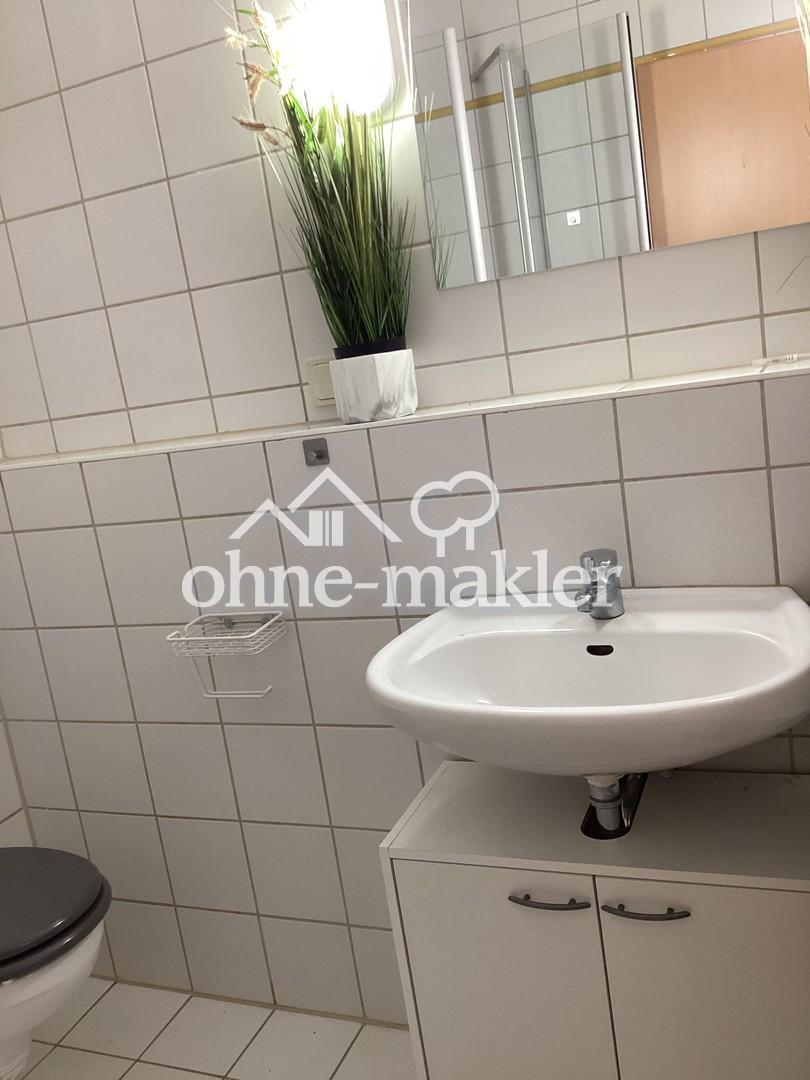 Lichtdurchflutete 1-Zimmer-Wohnung mit moderner Einbauküche & TG-Stellplatz - Foto 5