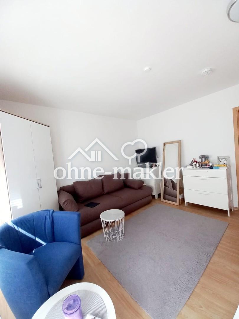 Lichtdurchflutete 1-Zimmer-Wohnung mit moderner Einbauküche & TG-Stellplatz - Foto 1