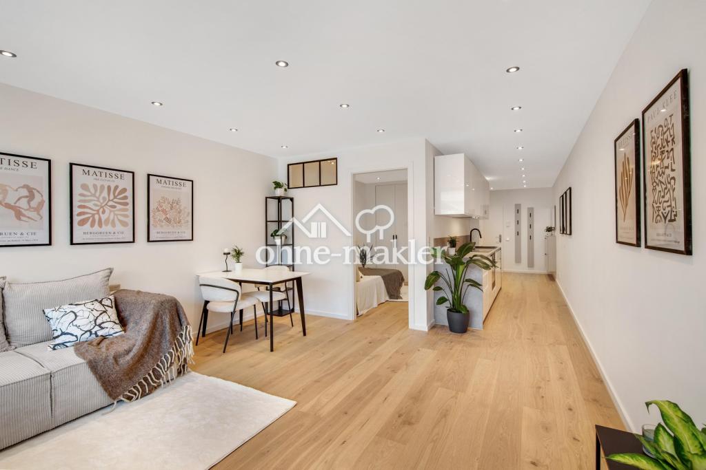 Erstbezug nach Kernsanierung: Exklusive Designerwohnung mit EBK, Balkon & TG-Stellplatz - Foto 2