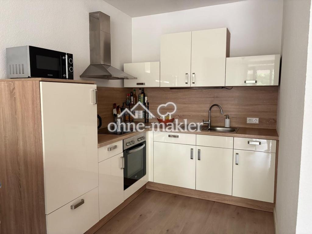 Helle 1-Zimmer-Wohnung mit großem Balkon, Einbauküche & Stellplatz in zentraler Lage - Photo 3