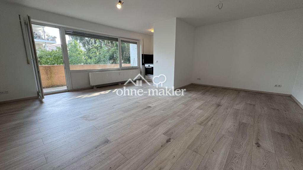 TOP RENOVIERTE 1-ZIMMER-WOHNUNG MIT NEUER EBK, BALKON & PKW-STELLPLATZ - Photo 1