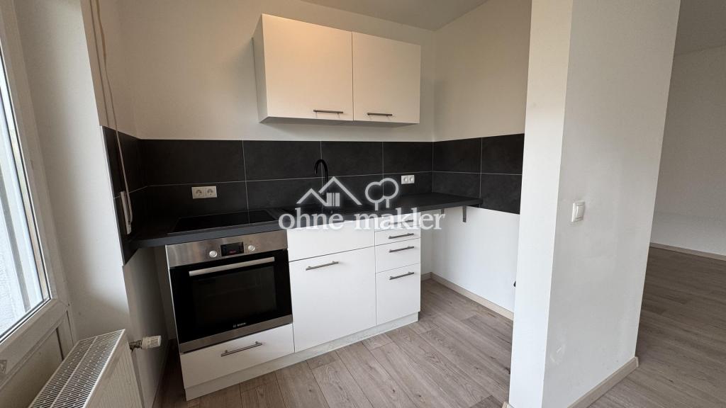 TOP RENOVIERTE 1-ZIMMER-WOHNUNG MIT NEUER EBK, BALKON & PKW-STELLPLATZ - Photo 3