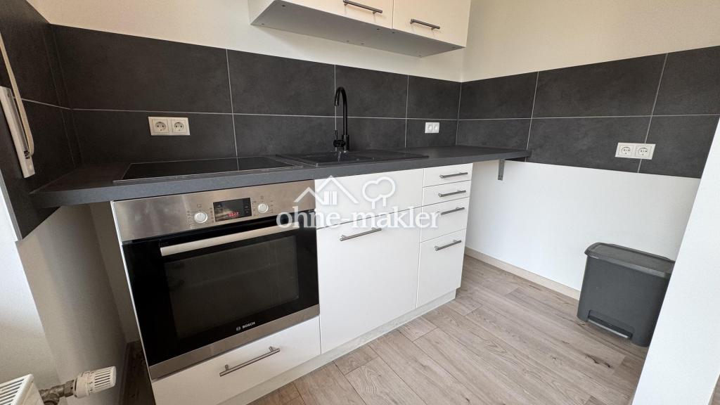 TOP RENOVIERTE 1-ZIMMER-WOHNUNG MIT NEUER EBK, BALKON & PKW-STELLPLATZ - Photo 4