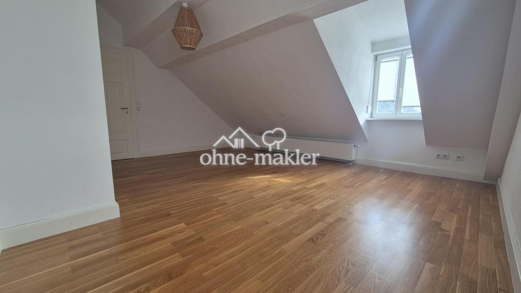 Großer Wohn-Essbereich in charmanter Maisonette-Wohnung - Foto 4