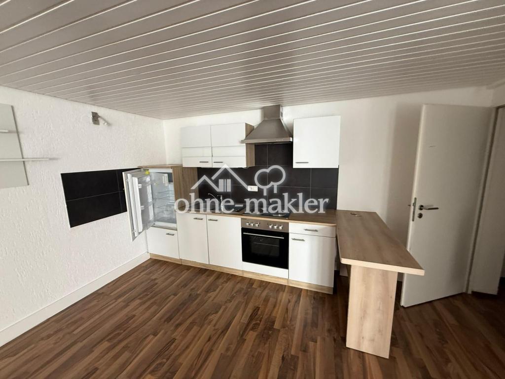 Helle Kellerwohnung mit Einbauküche und kleiner Terrasse - Foto 2