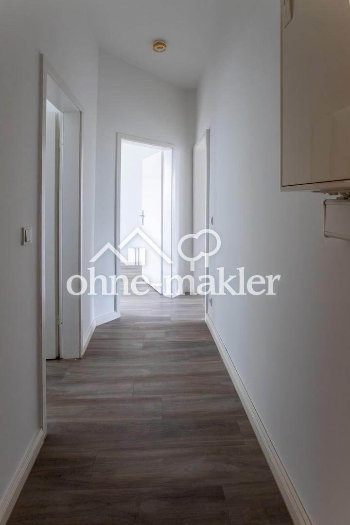 Helle sanierte 2-Zimmer-Altbauwohnung mit Einbauküche im Reiherstiegviertel - Photo 5