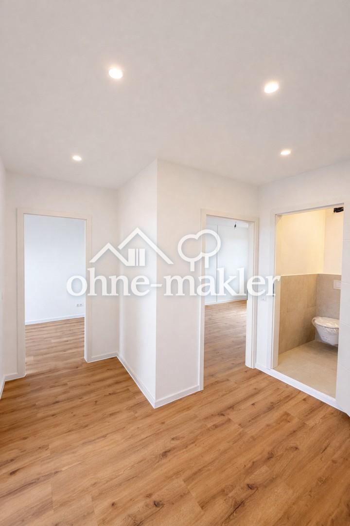 Kernsanierte 3-Zimmer-Wohnung mit moderner Einbauküche in zentraler Lage - Foto 5