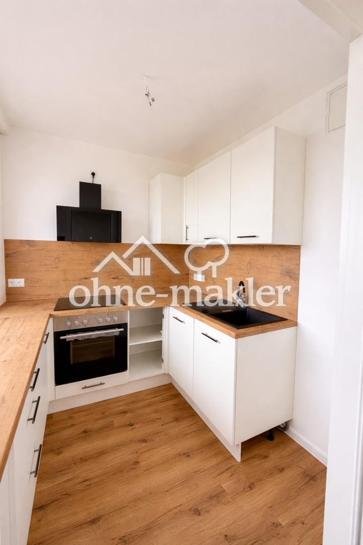 Kernsanierte 3-Zimmer-Wohnung mit moderner Einbauküche in zentraler Lage - Foto 2