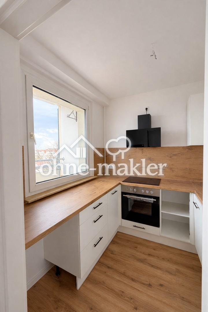 Kernsanierte 3-Zimmer-Wohnung mit moderner Einbauküche in zentraler Lage - Foto 1