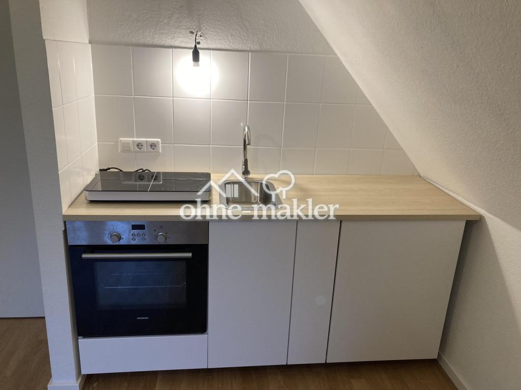Schöne 1-Zimmer Dachgeschosswohnung in denkmalgeschützter Villa in zentraler Lage von Radebeul - Foto 2