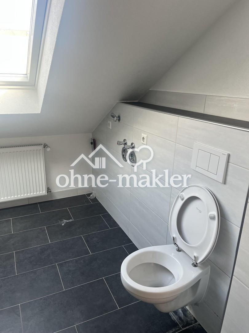 Wohnen am Rhein: Helle 3,5-Zimmer-Dachgeschosswohnung mit optimaler S-Bahn-Anbindung - Photo 3