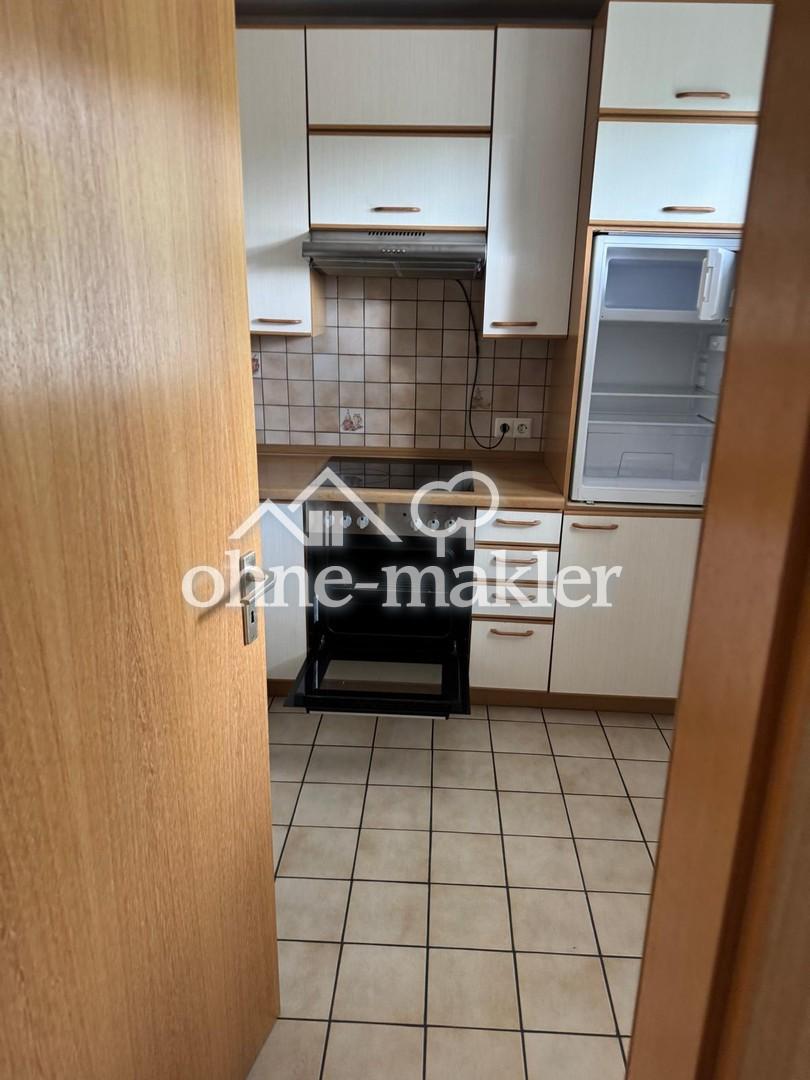 Helle 2-Zimmer-Wohnung mit Terrasse, Einbauküche & Tiefgaragenstellplatz - Foto 2