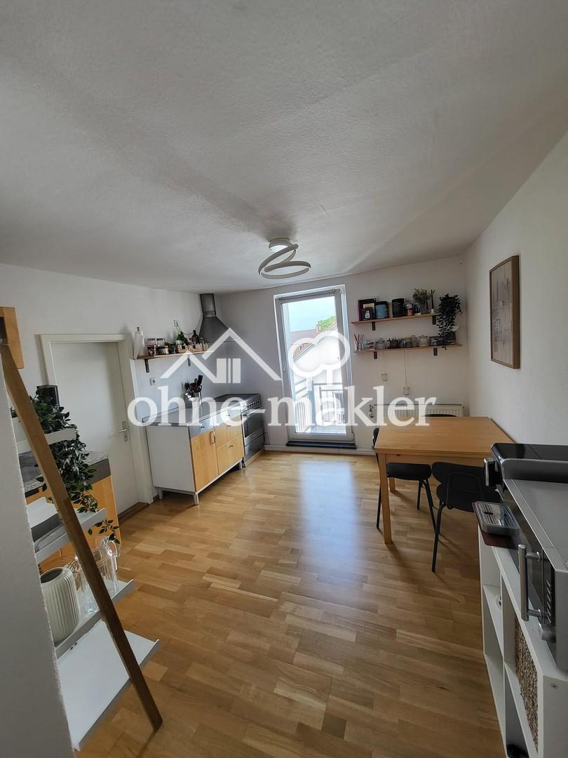 Zentral wohnen mit Weitblick – charmante Dachgeschosswohnung mit Balkon - Photo 3