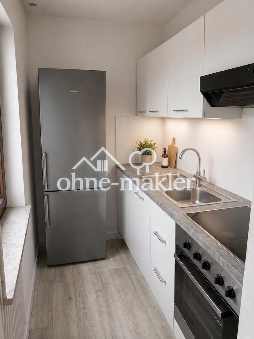 Frisch renovierte 2-Zimmer-Wohnung mit großem Westbalkon, Aufzug & Stellplatz - Photo 3