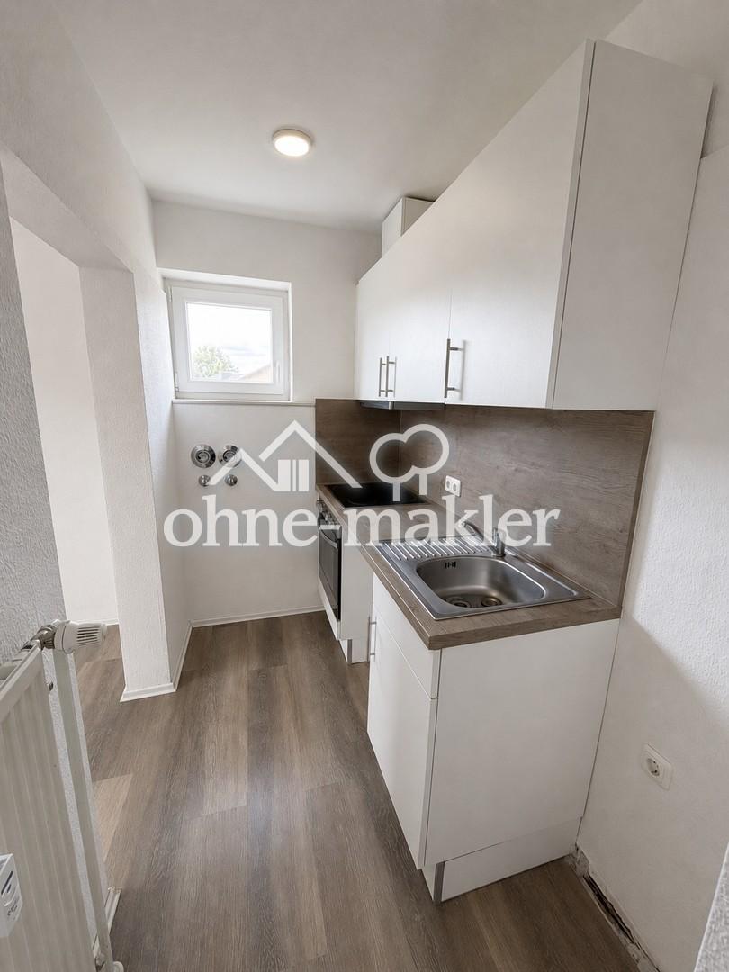 Renovierte 1-Zimmer-Wohnung mit Südwestbalkon und Einbauküche – zentral in Bad Bevensen - Foto 2