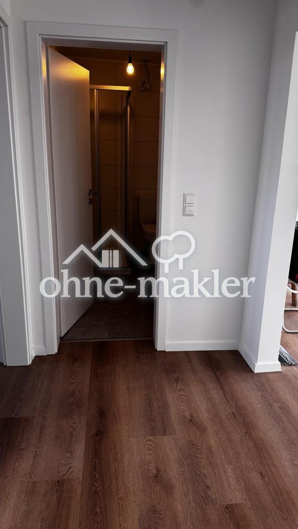 Erstbezug nach Renovierung: Moderne 2ZKB mit großer Dachloggia, EBK und Stellplatz - Foto 5