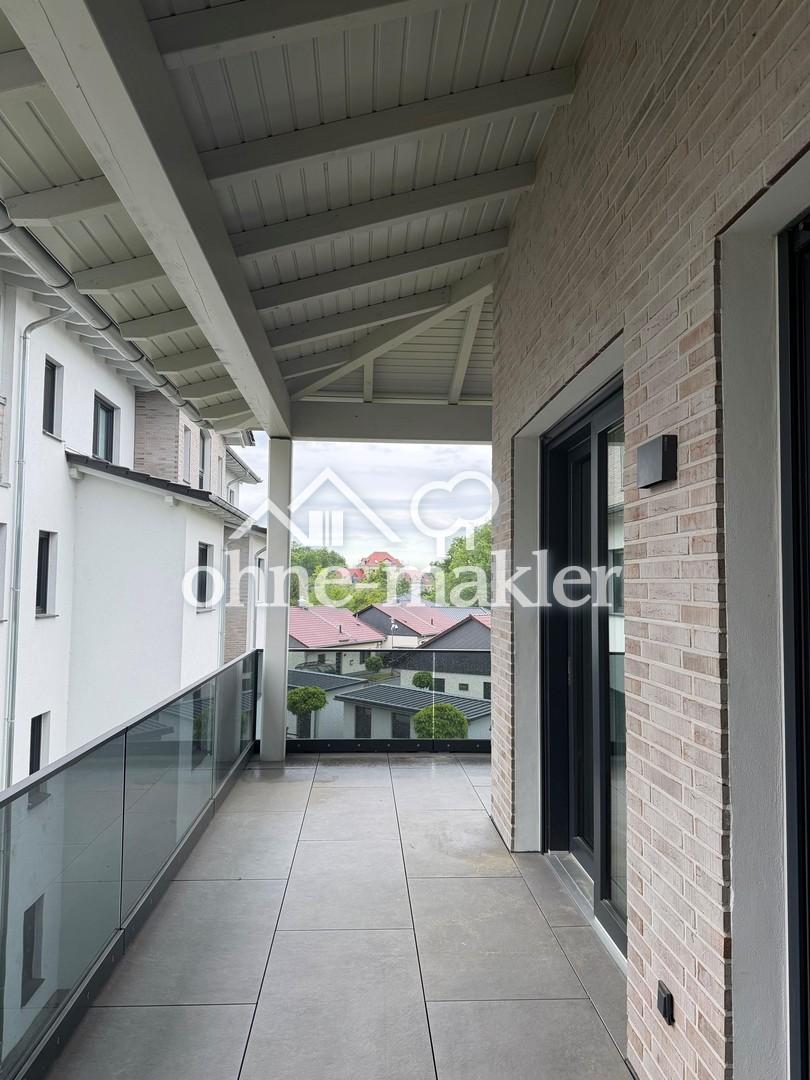 Moderne 4-Zimmer-Wohnung mit großzügiger, überdachter Terrasse/Balkon, Aufzug & Wärmepumpe - Foto 4