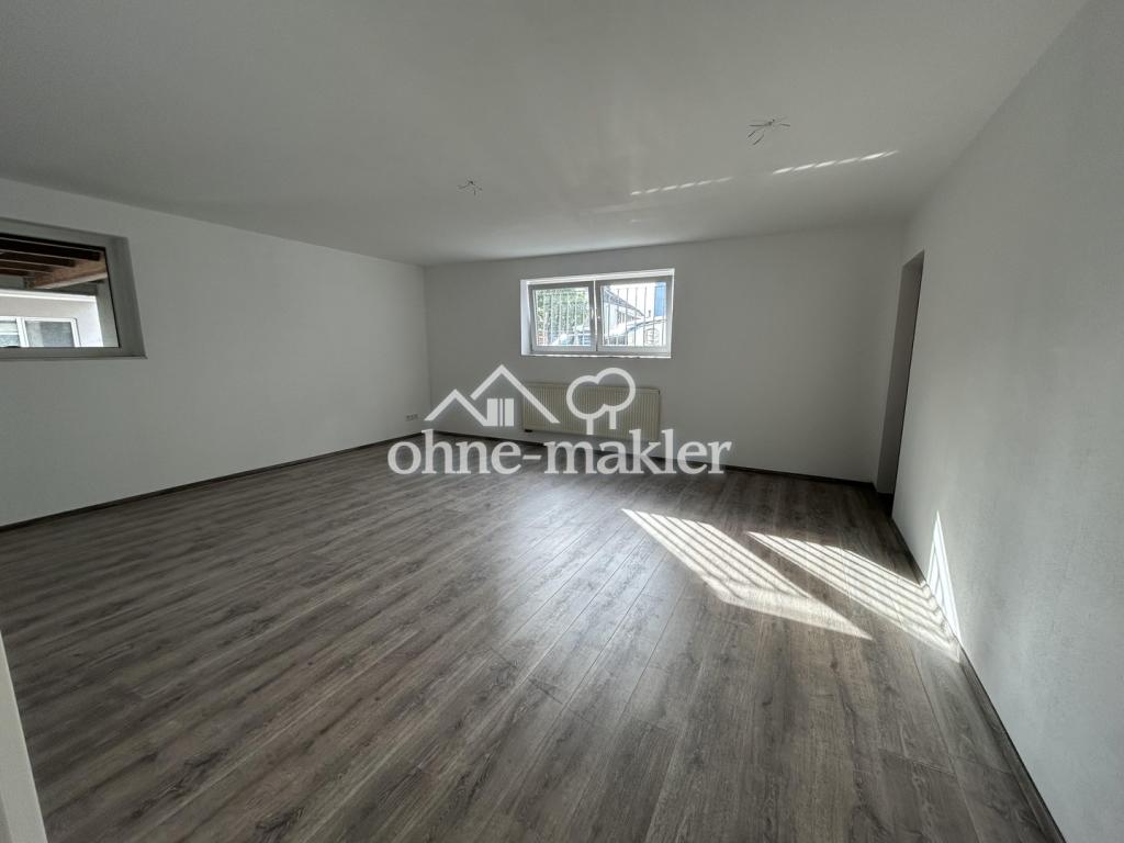 Helle Souterrainwohnung mit EBK & Stellplatz - Foto 1