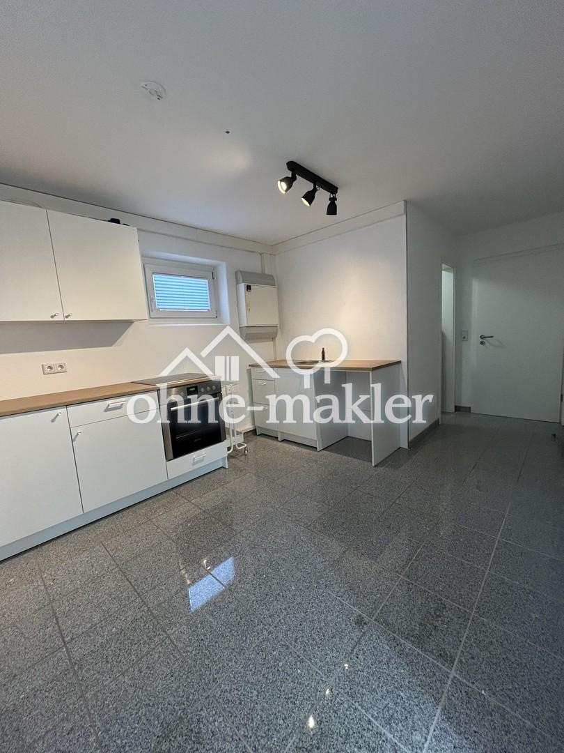 Helle Souterrainwohnung mit EBK & Stellplatz - Foto 2