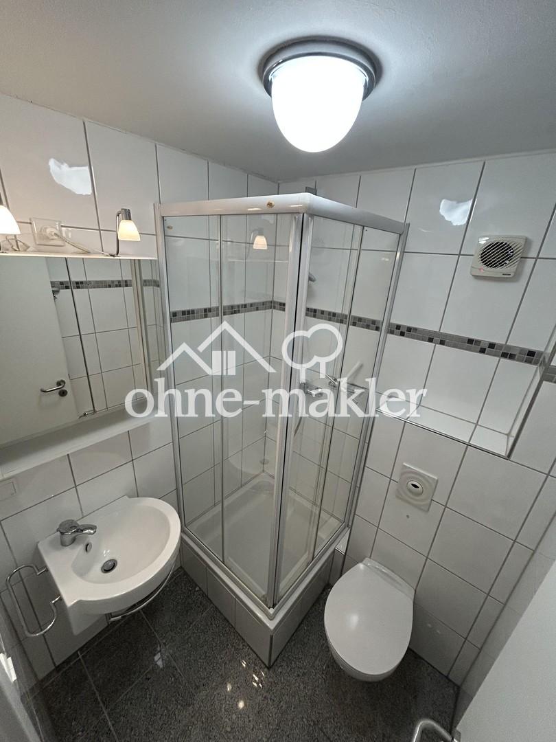 Helle Souterrainwohnung mit EBK & Stellplatz - Foto 3