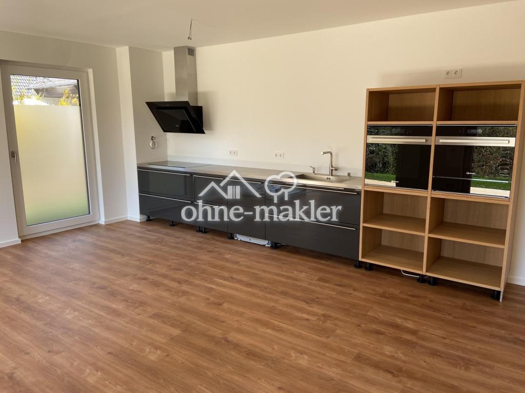 Wunderschöne Neubauwohnung mit eigenem Garten - Foto 1