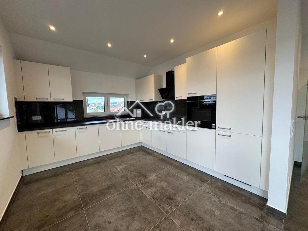 Moderne 9-Zimmer-Neubauwohnung mit ca. 235 m², zwei Küchen und zwei Balkonen in Rodenbach - Foto 5