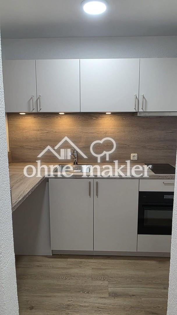 Frisch renovierte Souterrainwohnung mit neuer Einbauküche in zentraler Lage von Heiligenhafen - Photo 3