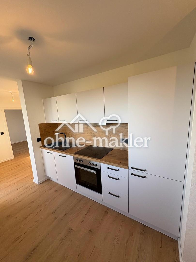 Erstbezug nach Kernsanierung: helle 3,5-Zimmer-Wohnung mit 2 Balkonen, EBK und TG-Garage - Foto 4