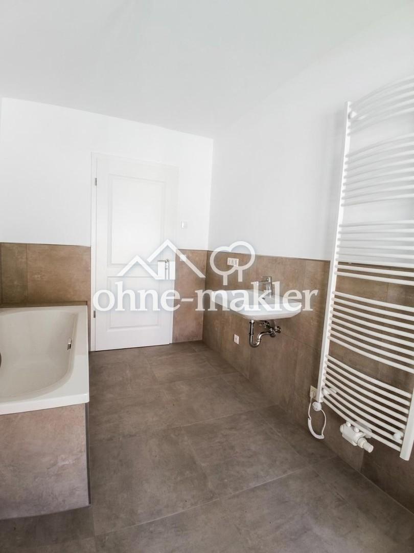 Bungalow-Neubau-Doppelhaushälfte in ruhiger grüner Randlage in Cottbus-Kiekebusch - Photo 2