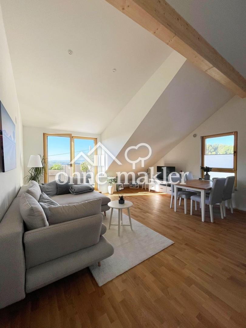Lichtdurchflutete Dachgeschosswohnung mit Top-Ausstattung und weitem Ausblick - Photo 1