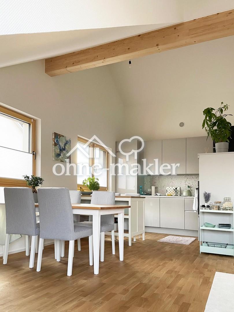 Lichtdurchflutete Dachgeschosswohnung mit Top-Ausstattung und weitem Ausblick - Photo 2