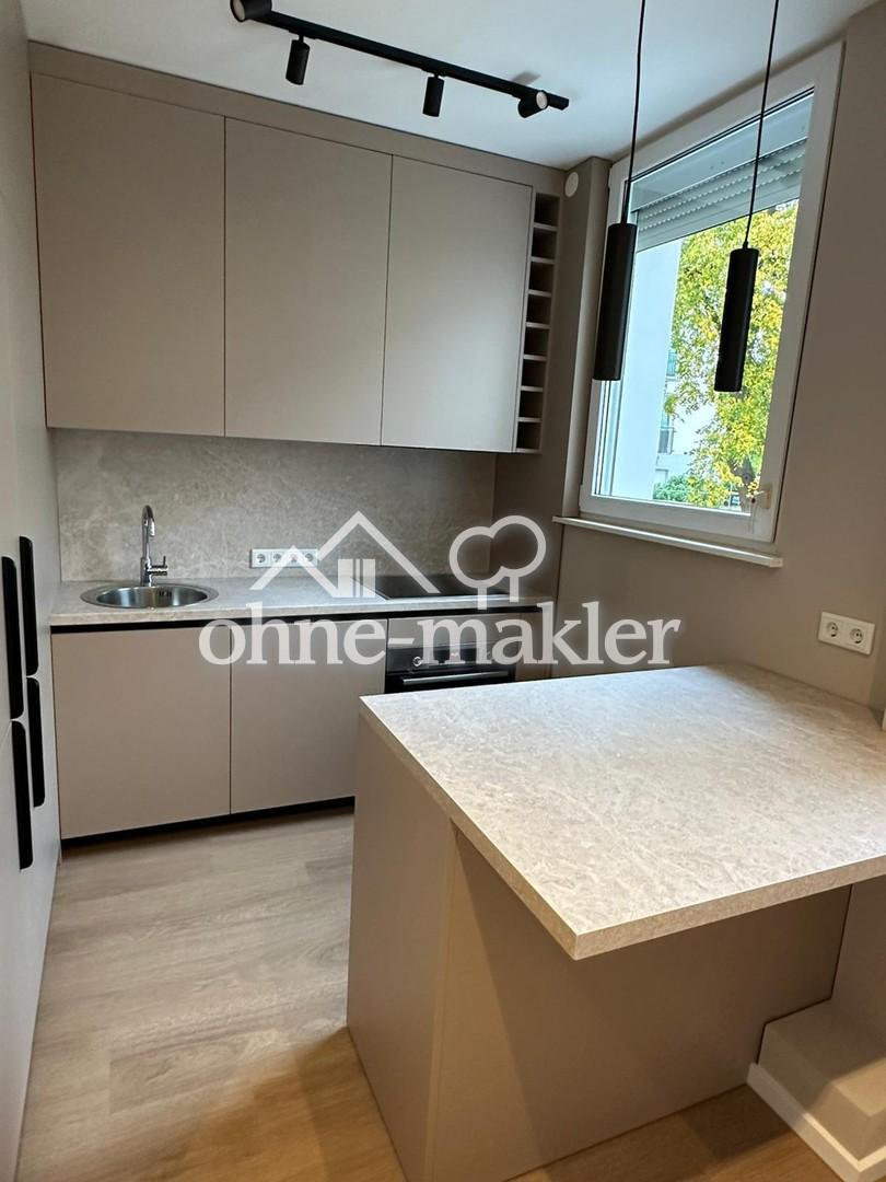 Neuwertig kernsanierte 2-Zimmer-Wohnung mit Balkon, Designer-Küche & Ankleide in Westend - Foto 3