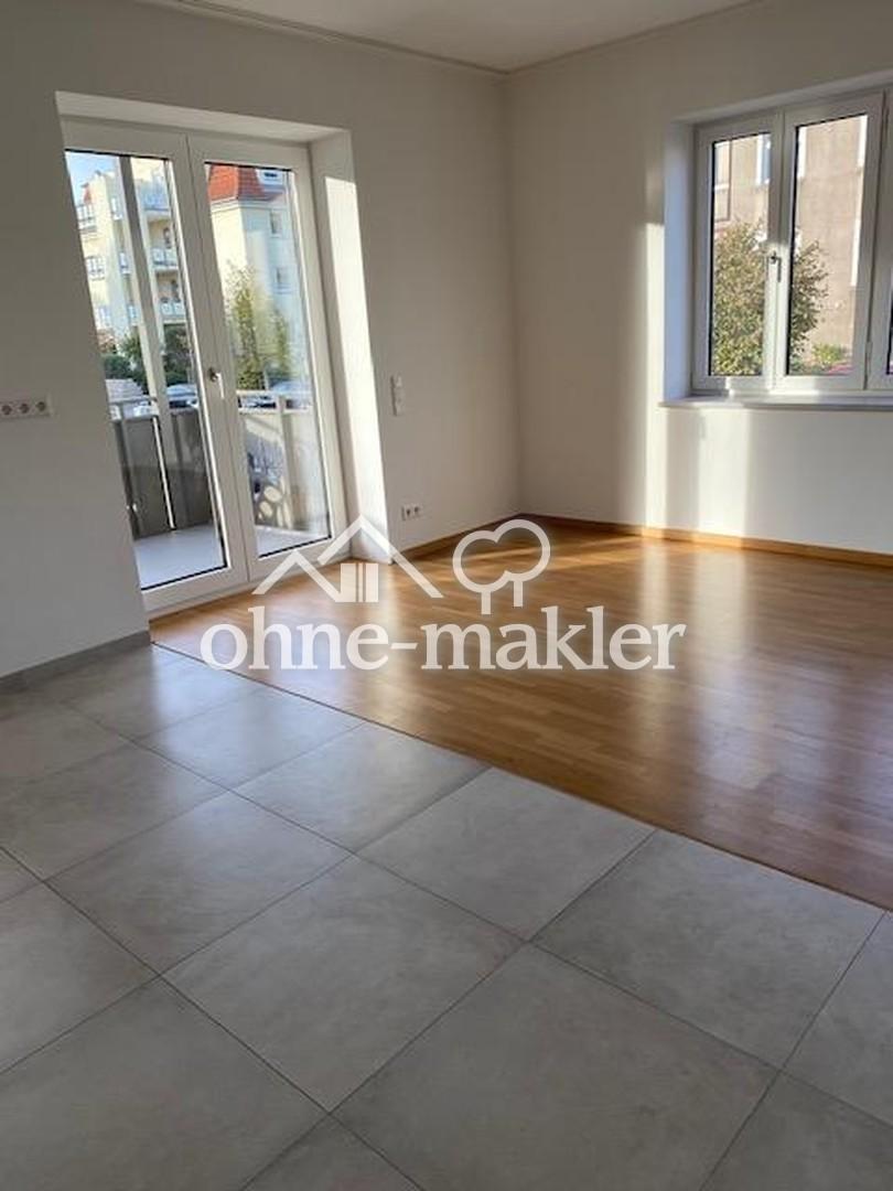 Exklusive 3,5-Zimmer-Obergeschosswohnung mit einem großen Balkon - Foto 1