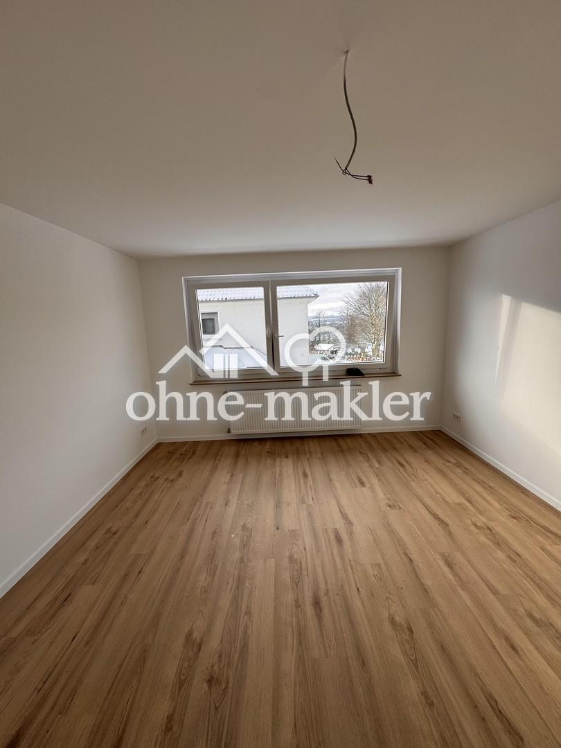 Erstbezug nach Sanierung mit EBK & Balkon - freundliche 2,5-Zimmer-Wohnung in Rinteln - Foto 5