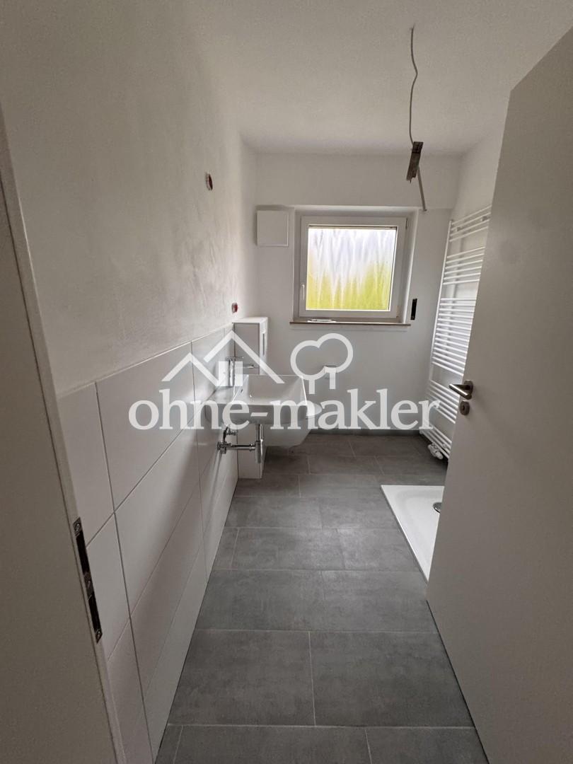 Erstbezug nach umfassender Sanierung: Helle 3-Zimmer-Wohnung mit EBK, Balkon & Garage - Foto 5