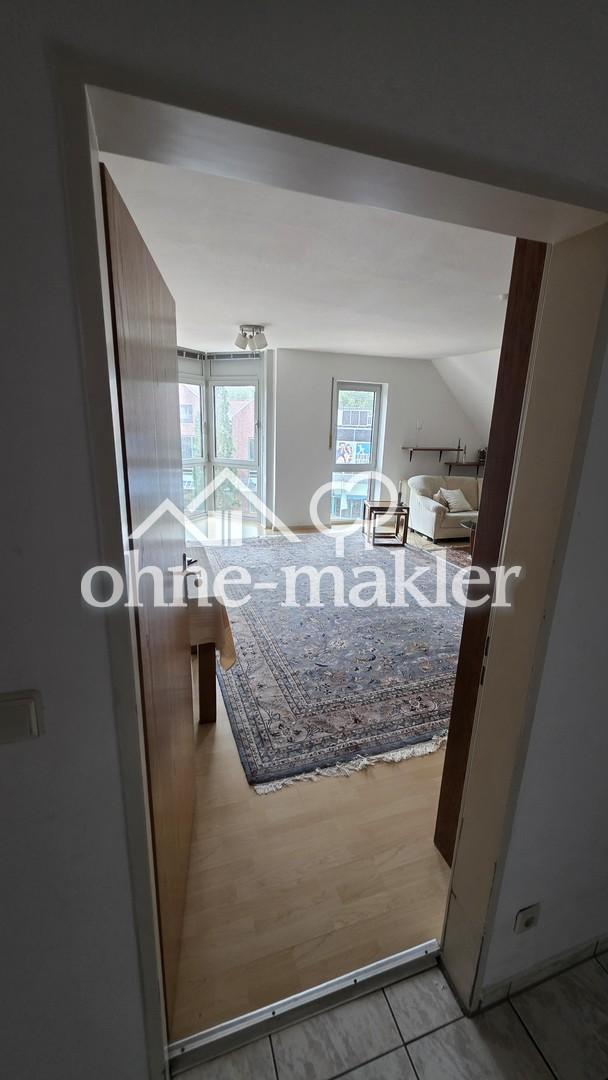 Helle 3-Zimmer-Dachgeschosswohnung mit Balkon und Aufzug, zentral in Spelle - Foto 1