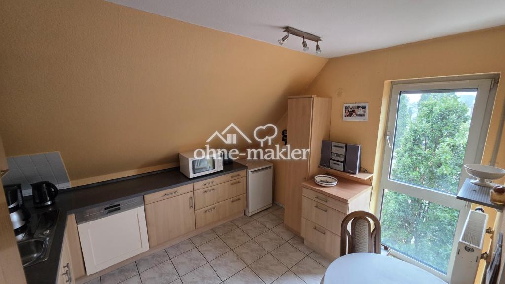 Helle 3-Zimmer-Dachgeschosswohnung mit Balkon und Aufzug, zentral in Spelle - Foto 5