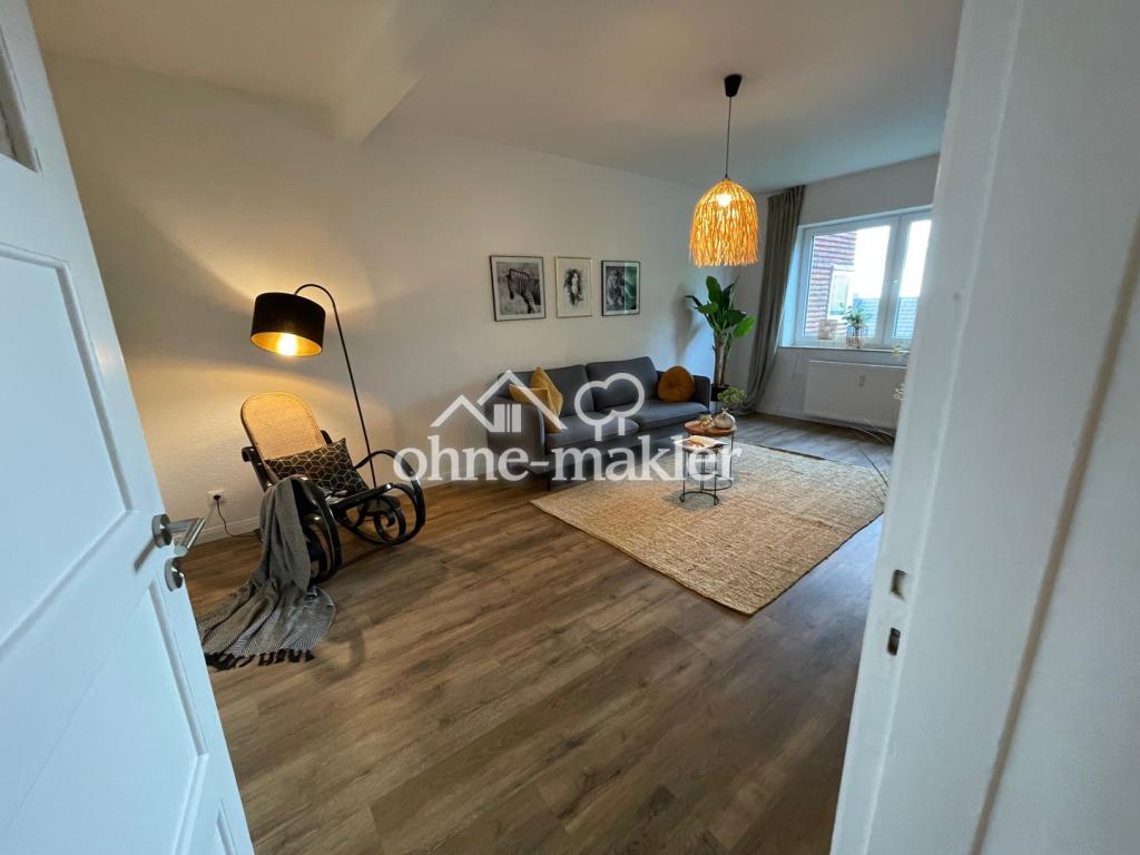 Sanierte 2Zi-Altbauwohnung in zentraler Lage inkl. Stellplatz | Meerblick - Photo 1