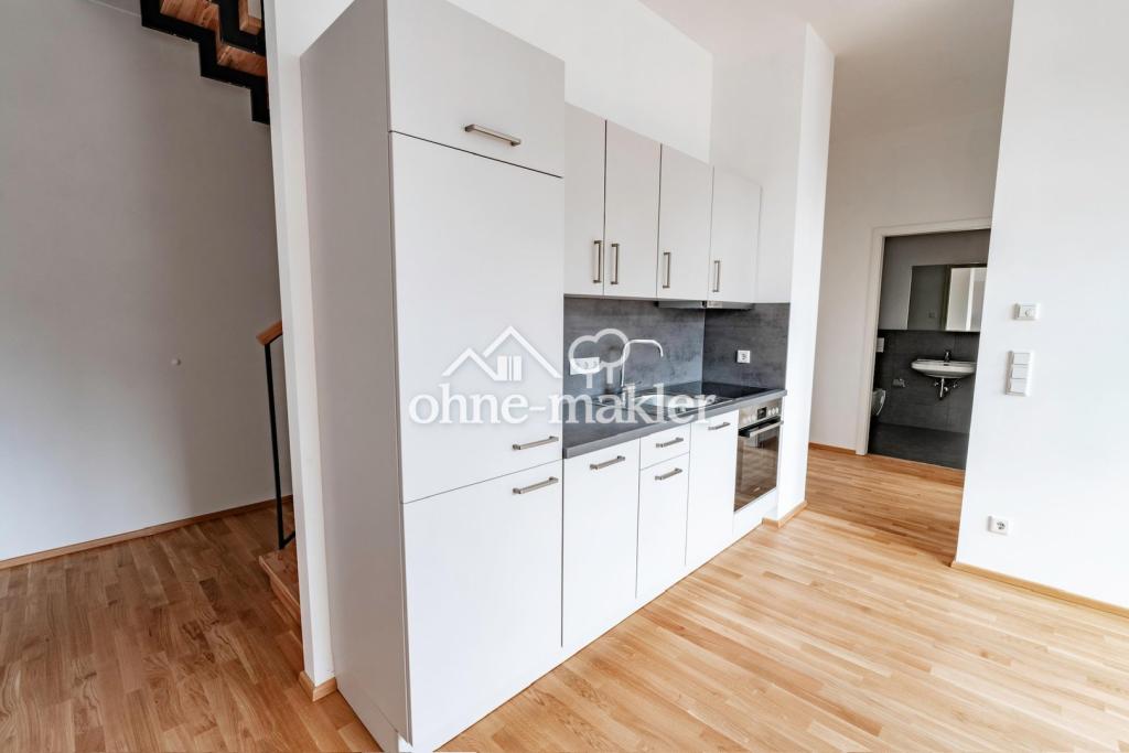 Lichtdurchflutete Neubau 3,5-Zimmer Maisonettewohnung: Loft-Charakter in zentraler Lage - Foto 3