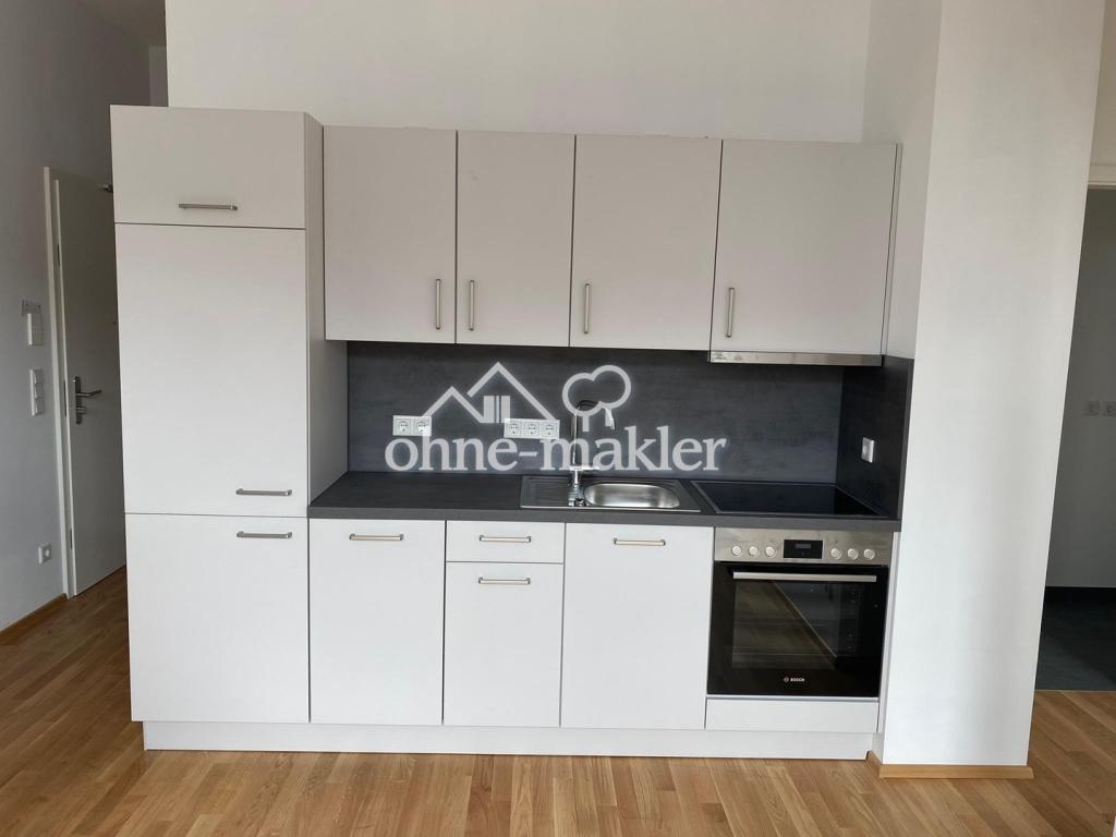 Lichtdurchflutete Neubau 3,5-Zimmer Maisonettewohnung: Loft-Charakter in zentraler Lage - Foto 2