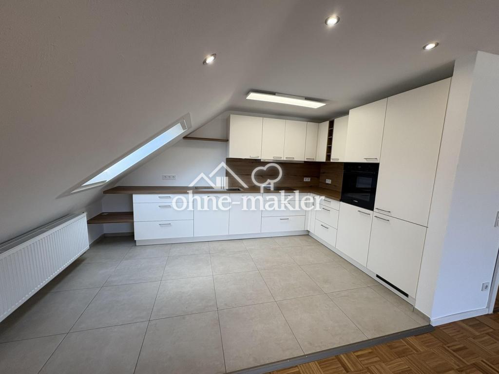 Kernsanierte Dachgeschosswohnung in ruhiger Lage - Photo 2