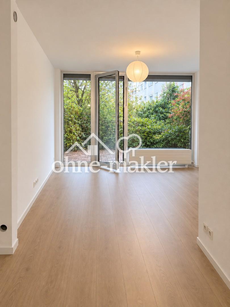 Sanierte 2-Zimmer-Wohnung mit Terrasse, neuer Küche und TG-Stellplatz - Foto 1